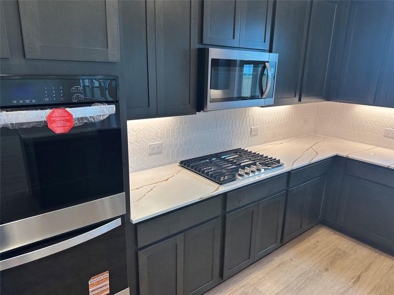 Furnished interior view inside a new home in Salerno - Classic Collection, Round Rock (Image 13). Furnished interior view inside a new home in Salerno - Classic Collection, Round Rock (Image 13).