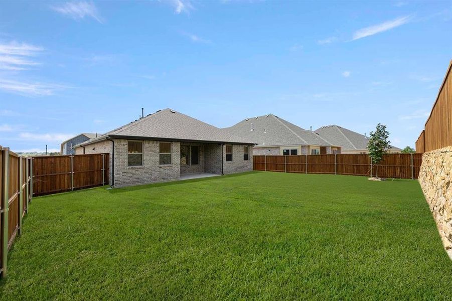 Exterior details and patio area of a home in Brookshire at Legacy Hills, Celina (Image 3).