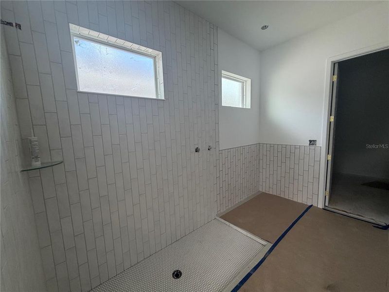 In-progress construction of a new home in Northlake at Ovation, Winter Garden, FL (Image 57).