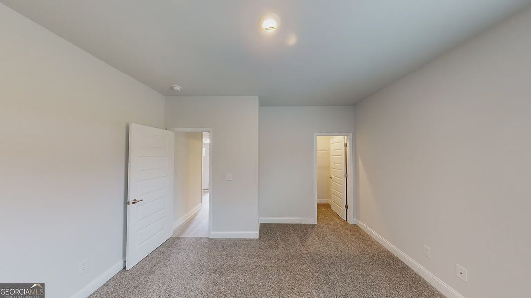 Spacious, unfurnished interior of a new home in Holliday Pass, Griffin (Image 15).