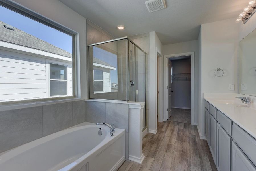 Representative furnished interior of a home built from the Austin by Ashton Woods in Hennersby Hollow, San Antonio (Image 7). Representative furnished interior of a home built from the Austin by Ashton Woods in Hennersby Hollow, San Antonio (Image 7).