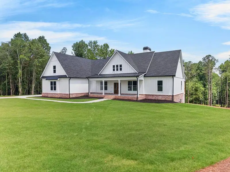Front exterior of a new home in , Fairmount, GA, highlighting curb appeal (Image 32). Front exterior of a new home in , Fairmount, GA, highlighting curb appeal (Image 32).