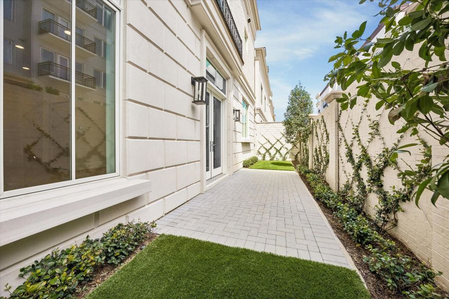 Options for patio upgrades include brick pavers, artificial turf, landscaping, or trellis along the fence. **Photo is of another home in the community and for information purposes only. Buyer to verify all details.** Options for patio upgrades include brick pavers, artificial turf, landscaping, or trellis along the fence. **Photo is of another home in the community and for information purposes only. Buyer to verify all details.**