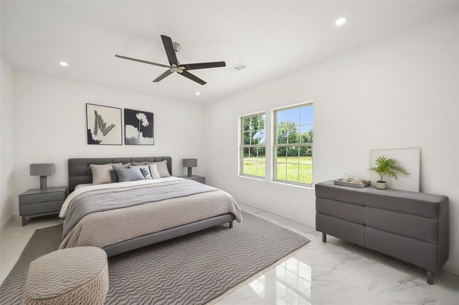 Bedroom featuring light marble finish floors, recessed lighting, and a ceiling fan Bedroom featuring light marble finish floors, recessed lighting, and a ceiling fan