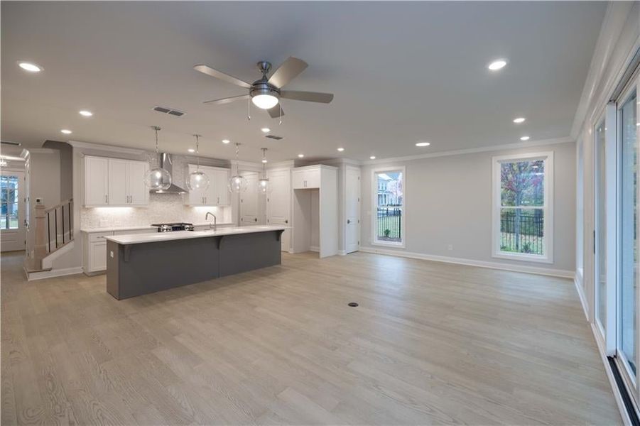 Open design, perfect for entertaining! *Please note photos shown are of the Ellington plan but not of the actual home.