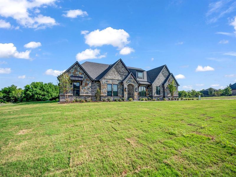 Front exterior of a new home in , Weatherford, TX, highlighting curb appeal (Image 26).