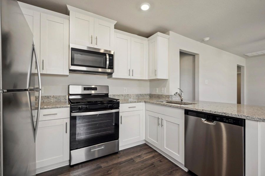 Furnished interior view inside a new home in Vacek Country Meadows, Richmond (Image 3).