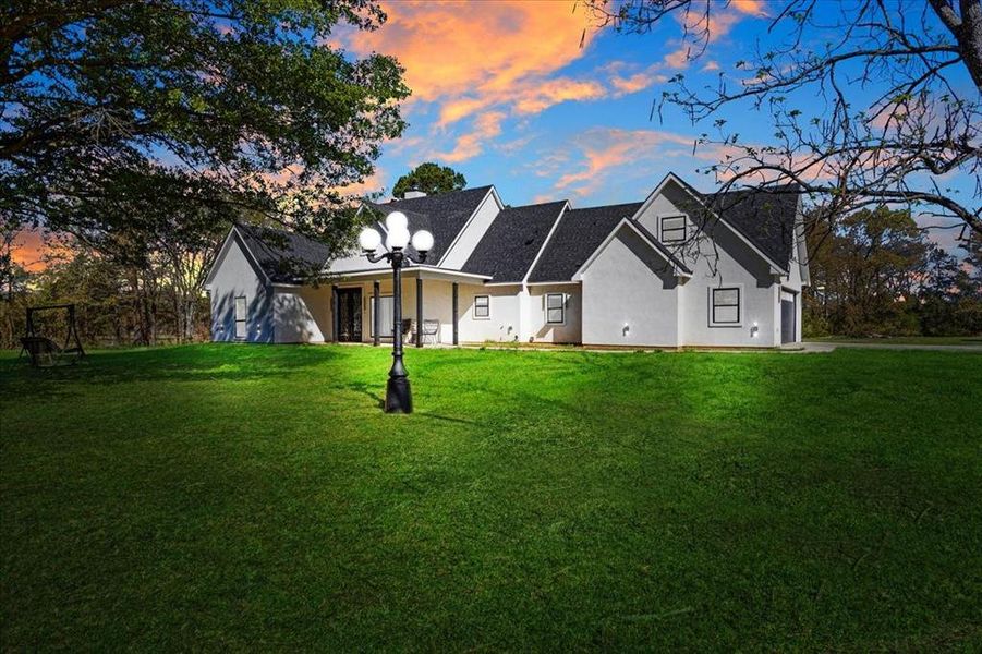 Front exterior of a new home in , Pittsburg, TX, highlighting curb appeal (Image 21).