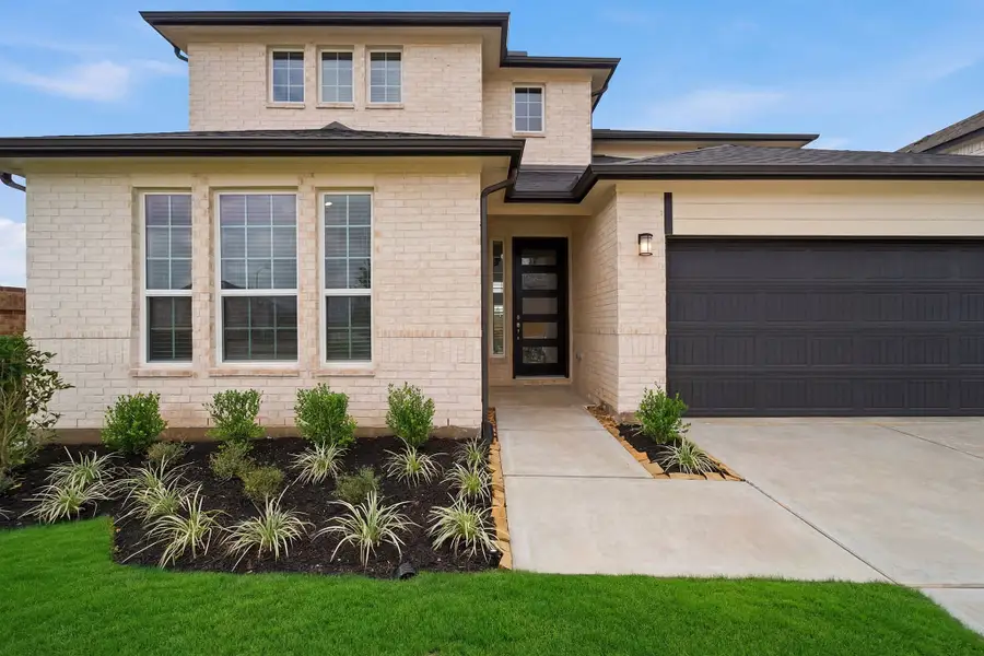 Exterior details and patio area of a home in Sunterra Lakes, Brookshire (Image 3). Exterior details and patio area of a home in Sunterra Lakes, Brookshire (Image 3).