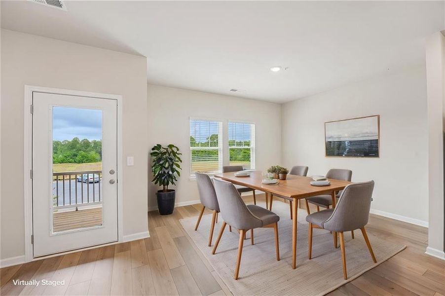 Furnished interior view inside a new home in Hemingway - Highland Series, Cumming (Image 8).