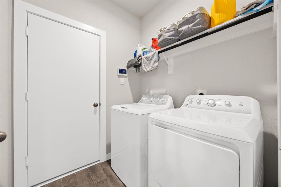 Furnished interior view inside a new home in Sunterra, Katy (Image 12).