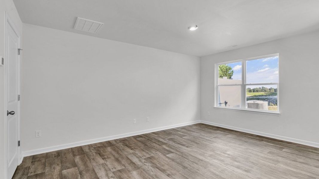 Spacious, unfurnished interior of a new home in The Townes at Honeycutt Oaks, Angier (Image 6). Spacious, unfurnished interior of a new home in The Townes at Honeycutt Oaks, Angier (Image 6).