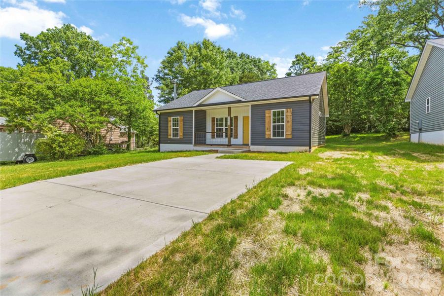 Front exterior of a new home in , Chester, SC, highlighting curb appeal (Image 17).