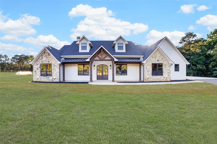 Front exterior of a new home in , Longview, TX, highlighting curb appeal (Image 23). Front exterior of a new home in , Longview, TX, highlighting curb appeal (Image 23).