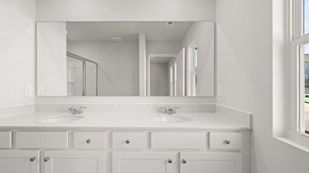 Furnished interior view inside a new home in Waypoint, Flowery Branch (Image 11).