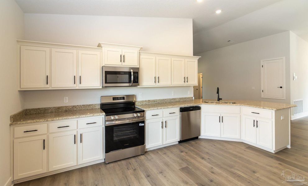 Furnished interior view inside a new home in Parkland Place, Pace (Image 5).