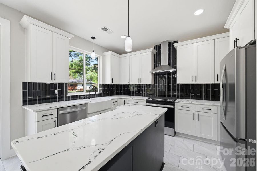 Furnished interior view inside a new home in , Huntersville (Image 9).