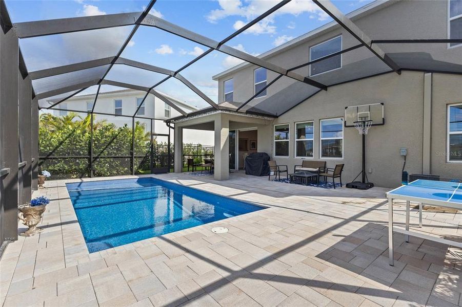 Exterior details and patio area of a home in Evergreen, Bradenton (Image 24).