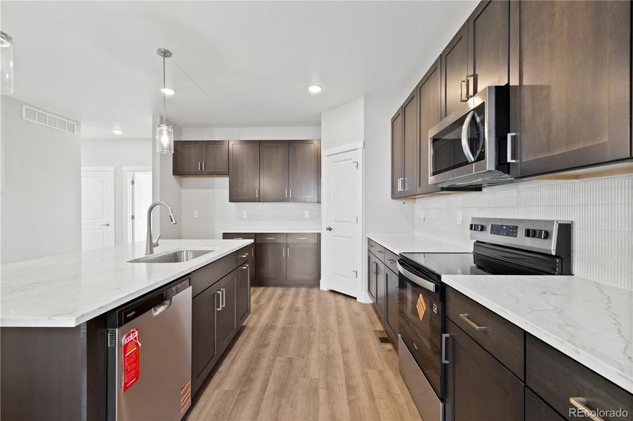 Furnished interior view inside a new home in Windler Single Family Homes, Aurora (Image 9). Furnished interior view inside a new home in Windler Single Family Homes, Aurora (Image 9).