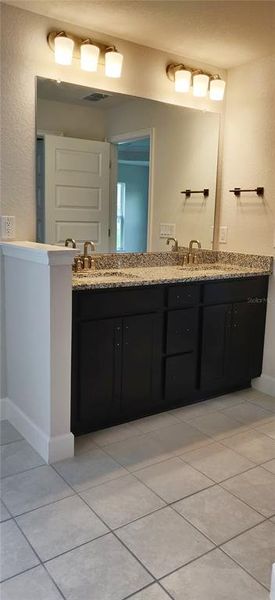 Furnished interior view inside a new home in Sunset Landing, Spring Hill (Image 7).