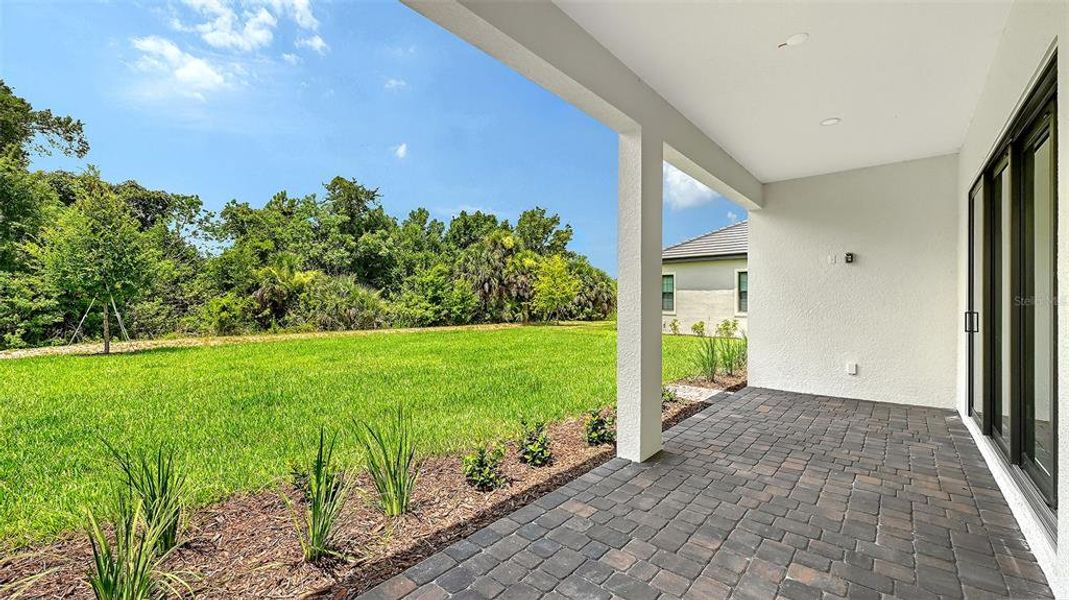 Exterior details and patio area of a home in Vistera of Venice, Nokomis (Image 4).