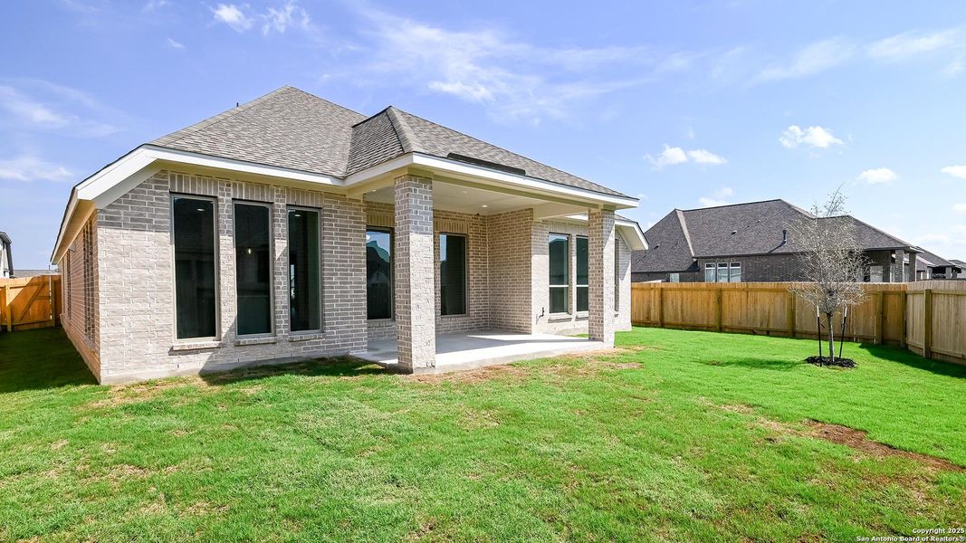 Exterior details and patio area of a home in Meadows Of Mill Creek 50', Seguin (Image 4). Exterior details and patio area of a home in Meadows Of Mill Creek 50', Seguin (Image 4).