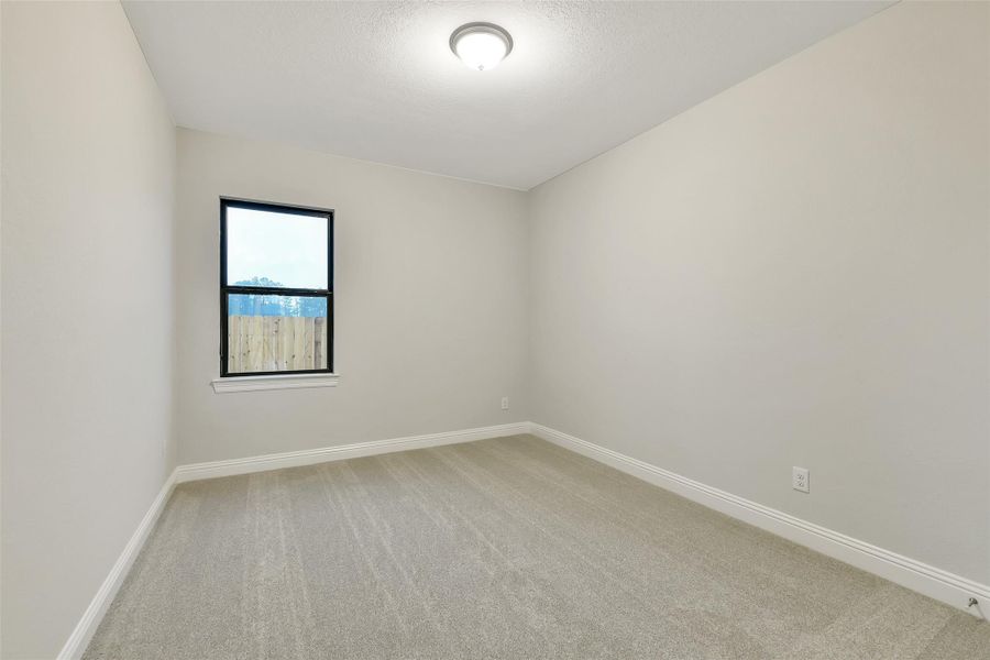 Spacious, unfurnished interior of a new home in Evergreen 60', Conroe (Image 13).
