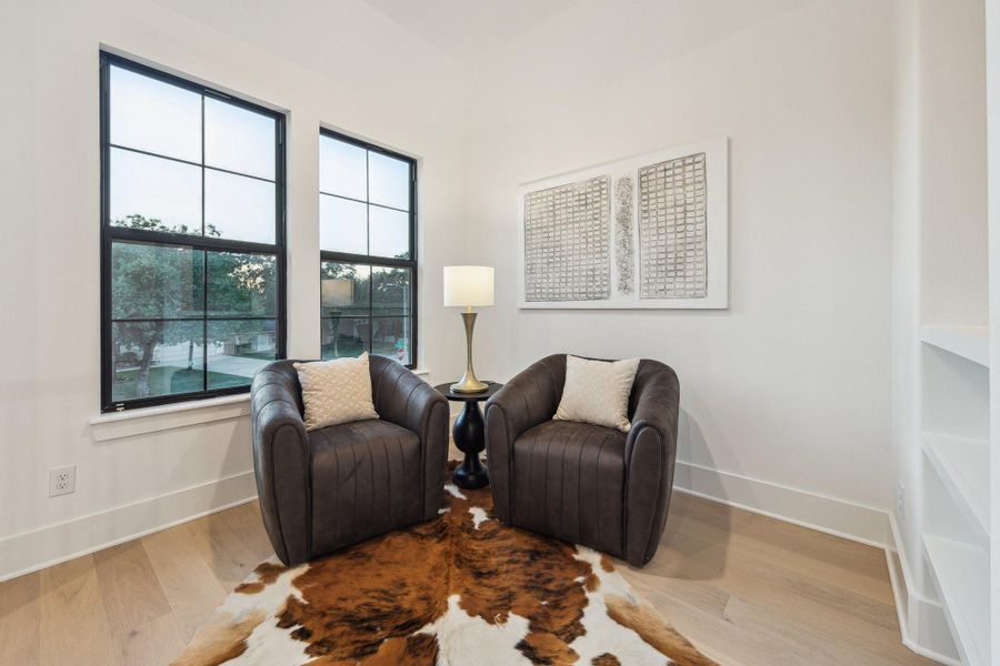 Another custom feature - cozy study nook adjacent to game room with built in shelves Another custom feature - cozy study nook adjacent to game room with built in shelves