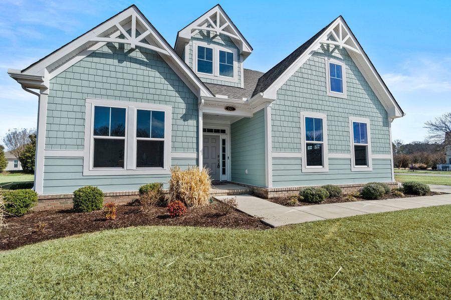 Front exterior of a new home in Belmont at Albemarle, Hertford, NC, highlighting curb appeal (Image 2). Front exterior of a new home in Belmont at Albemarle, Hertford, NC, highlighting curb appeal (Image 2).
