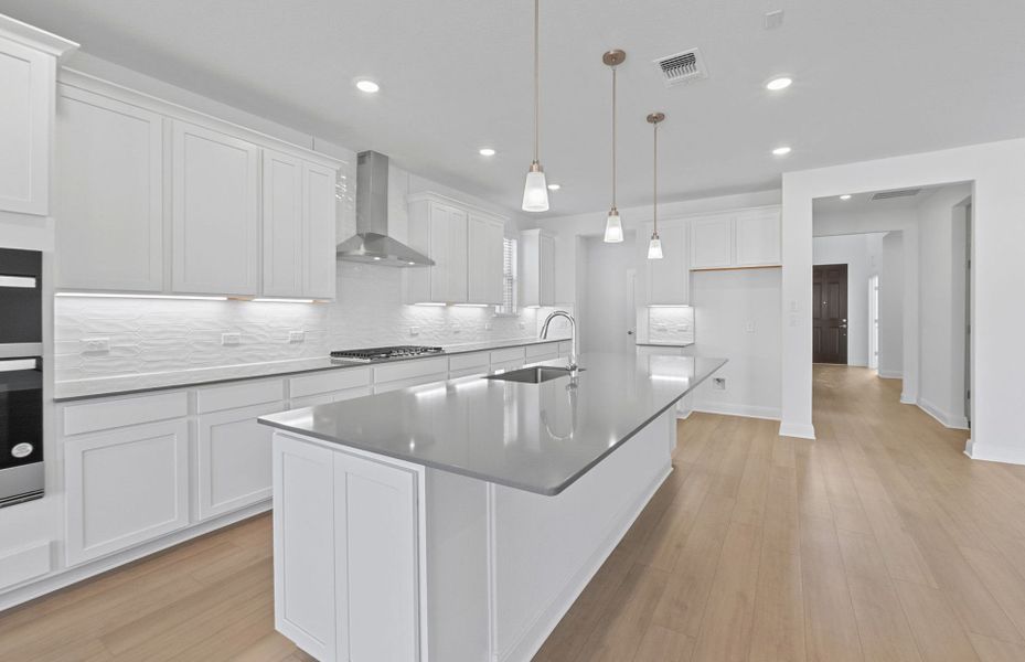 Furnished interior view inside a new home in Bluffview Reserve, Leander (Image 18).