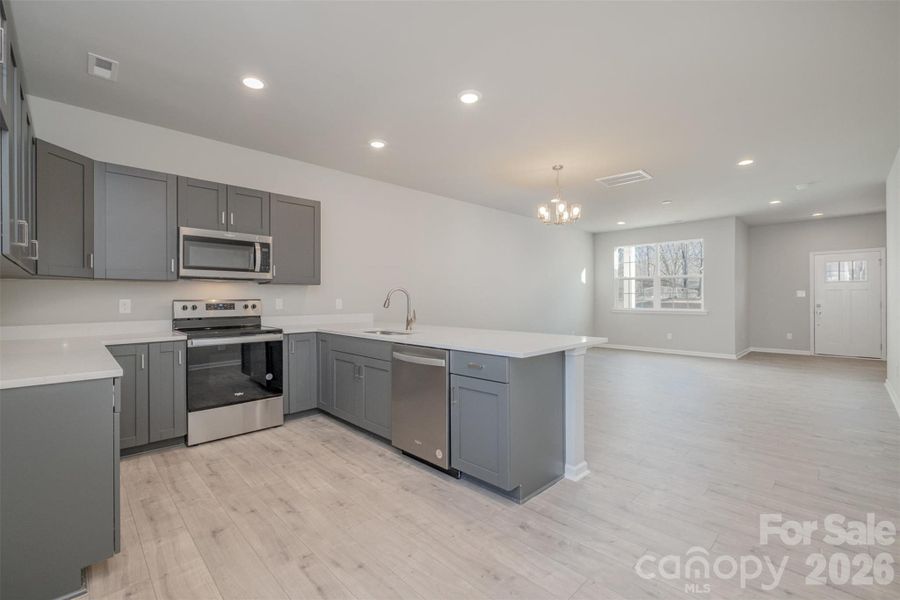 Furnished interior view inside a new home in , Concord (Image 12).
