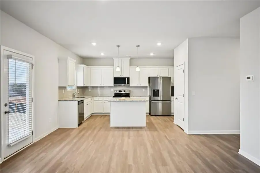 Furnished interior view inside a new home in The Hills at Cedar Creek, Winder (Image 25).