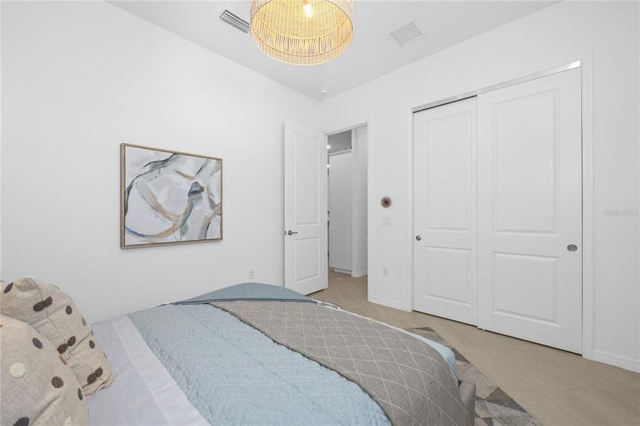 Furnished interior view inside a new home in Calusa Country Club, Lakewood Ranch (Image 12).