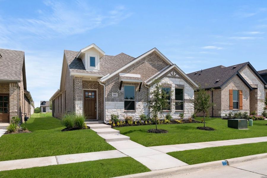 Front exterior of a new home in Redden Farms – Active Adult, Midlothian, TX, highlighting curb appeal (Image 2). Front exterior of a new home in Redden Farms – Active Adult, Midlothian, TX, highlighting curb appeal (Image 2).