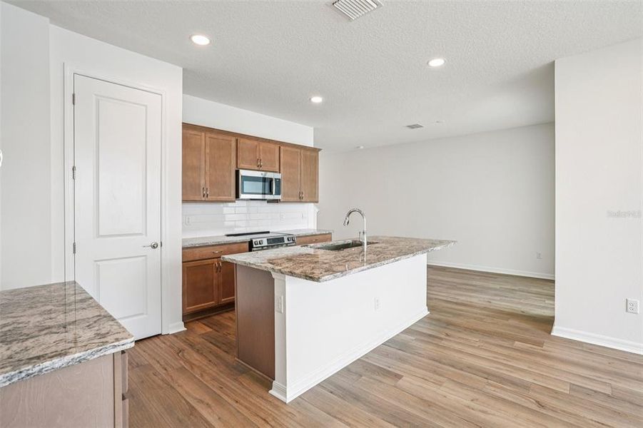 Furnished interior view inside a new home in Isla Mirada, San Antonio (Image 15).