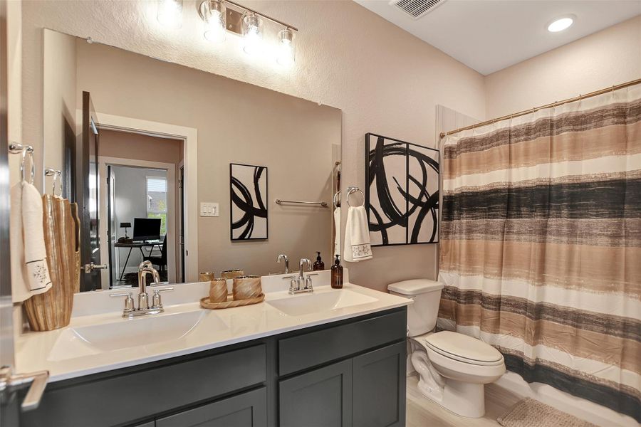 Furnished interior view inside a new home in Lone Star Landing, Montgomery (Image 39).