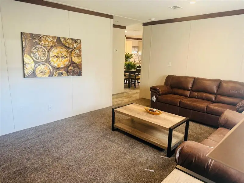 Furnished interior view inside a new home in , Fort White (Image 14).