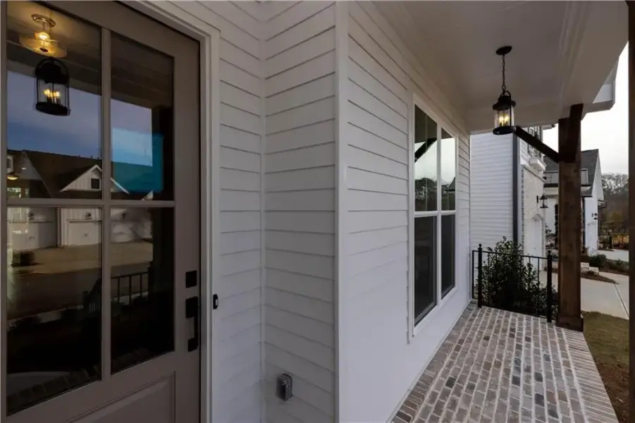 Exterior details and patio area of a home in Aberdeen, Hoschton (Image 32).