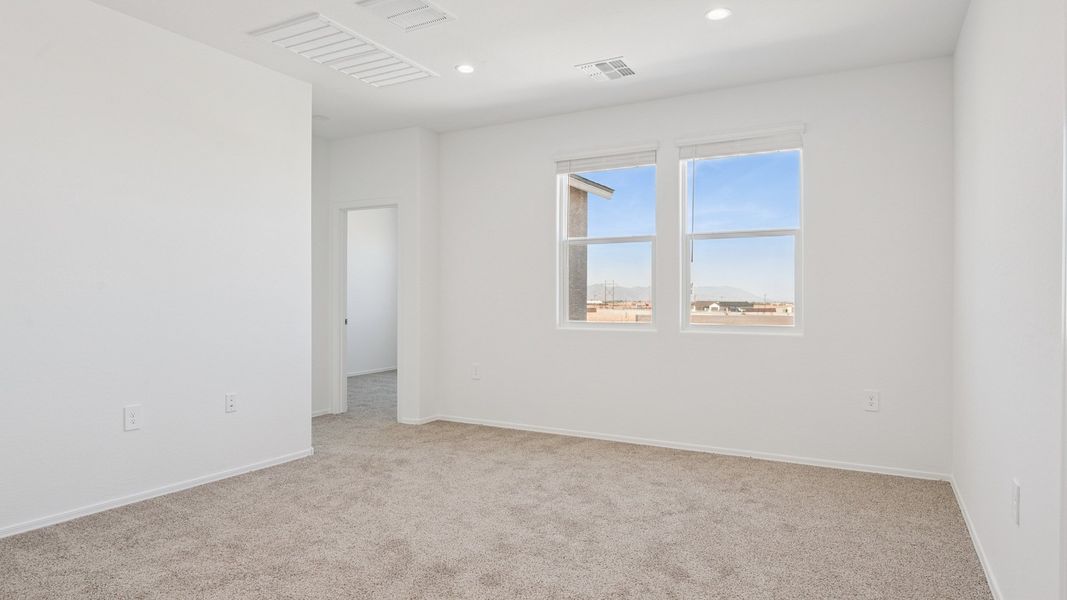 Representative unfurnished interior of a home built from the Ibis by D.R. Horton in Elena Trails, Maricopa (Image 26).