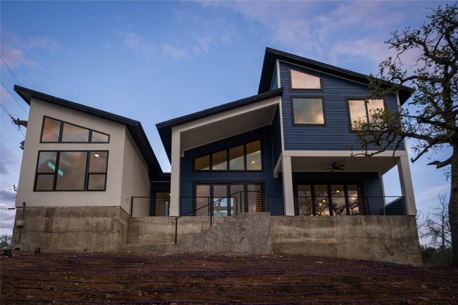 Back of house featuring ceiling fan