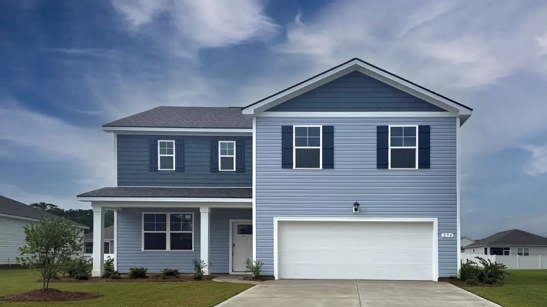 Front exterior of a new home in Eden Springs, Longs, SC, highlighting curb appeal (Image 1). Front exterior of a new home in Eden Springs, Longs, SC, highlighting curb appeal (Image 1).