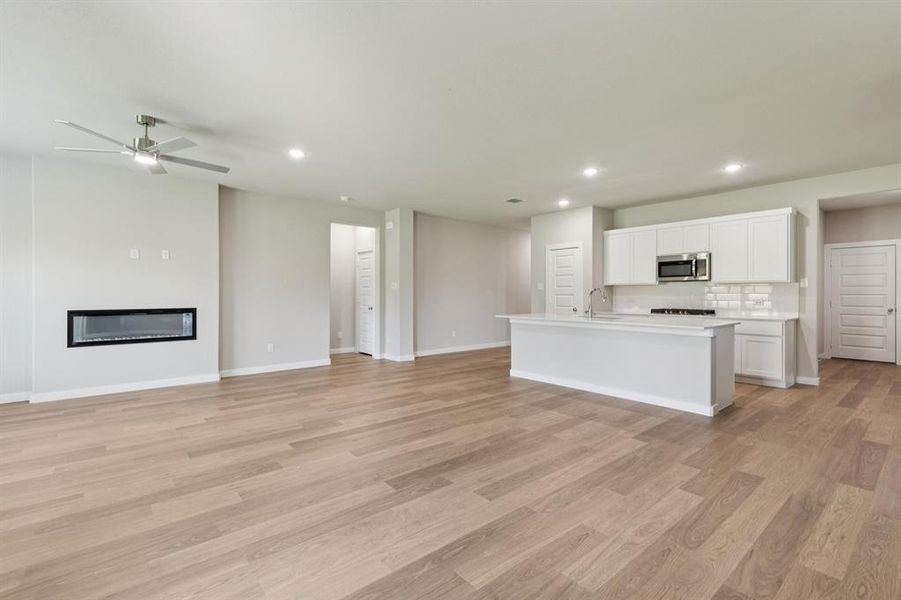 Open Floorplan in the Heisman home plan by Trophy Signature Homes – REPRESENTATIVE PHOTO