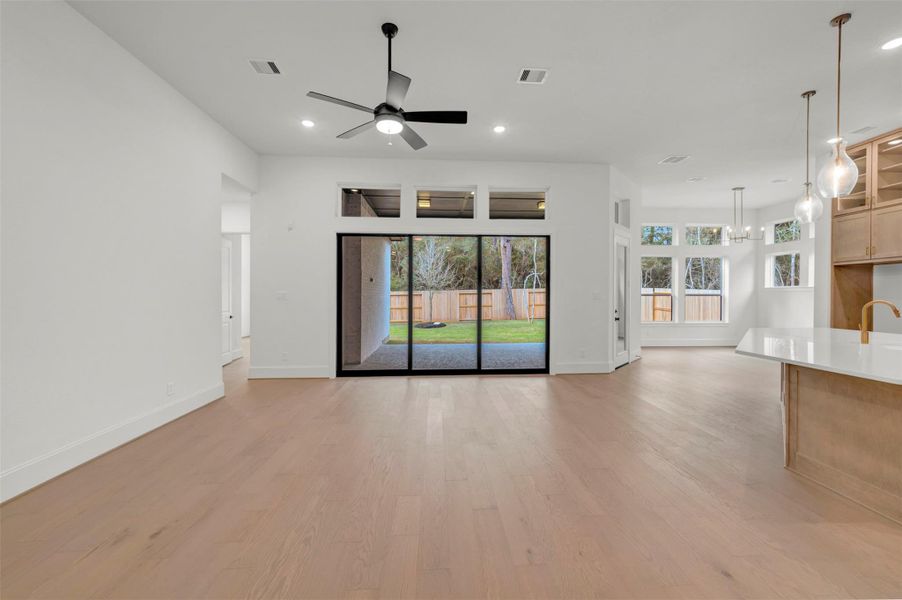 Spacious, unfurnished interior of a new home in The Woodlands Hills - Premier Collection, Willis (Image 19).