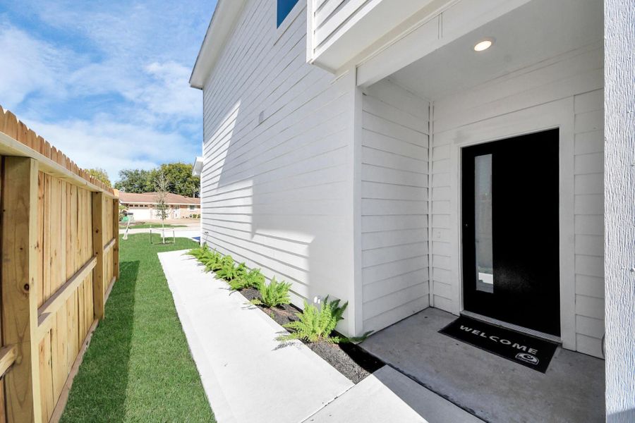 Exterior details and patio area of a home in , Houston (Image 4).