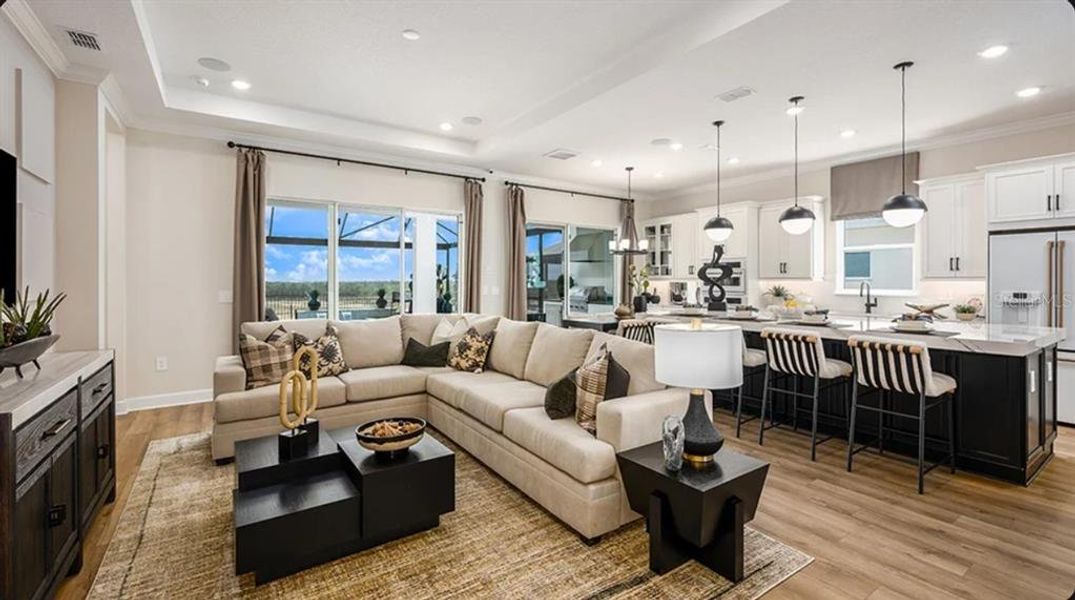 Furnished interior view inside a new home in Esplanade at McKinnon Groves, Winter Garden (Image 5).