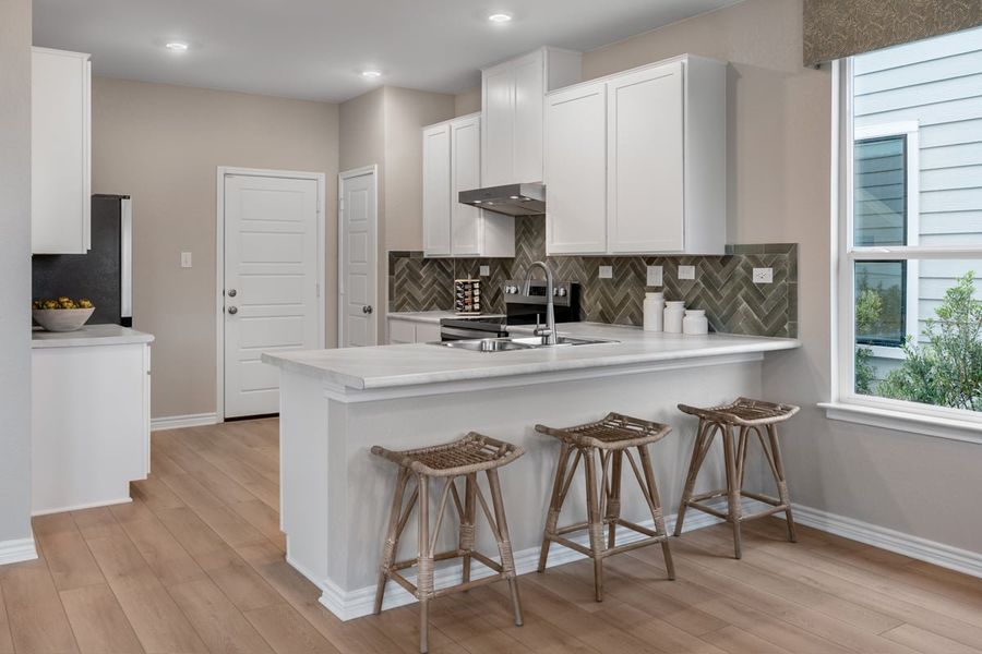 Representative furnished interior of a home built from the 1529 by KB Home in Medina Crossing - Villa Collection, Von Ormy (Image 5).