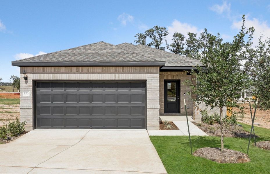 Front exterior of a new home in La Cima, San Marcos, TX, highlighting curb appeal (Image 21). Front exterior of a new home in La Cima, San Marcos, TX, highlighting curb appeal (Image 21).