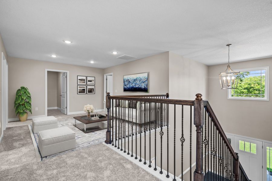 Representative furnished interior of a home built from the Emilia by Enchanted Homes in Guadalupe Heights, Seguin (Image 6).