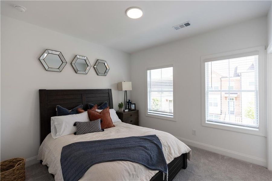 Furnished interior view inside a new home in Palisades Townhomes, Cumming (Image 14). Furnished interior view inside a new home in Palisades Townhomes, Cumming (Image 14).