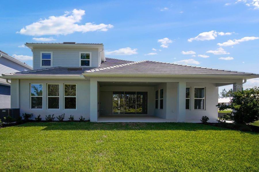 Exterior details and patio area of a home in Hammock at Two Rivers, Zephyrhills (Image 3).